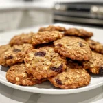 Warm Oatmeal Raisin Cookies on Cooling Rack