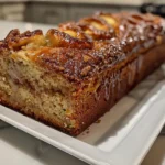 Overhead view of a sliced cinnamon roll zucchini bread loaf